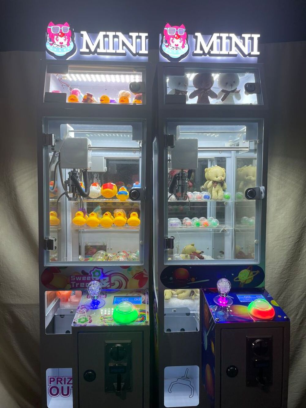 Machine &agrave; pince attrape peluche Jeux / jouets
