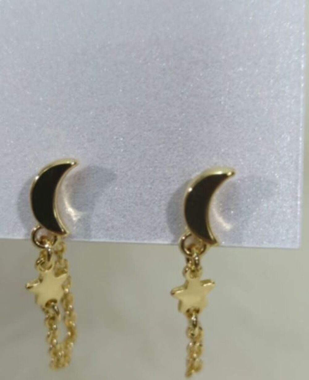 BOUCLE D'OREILLES COSMIQUE Bijoux et montres