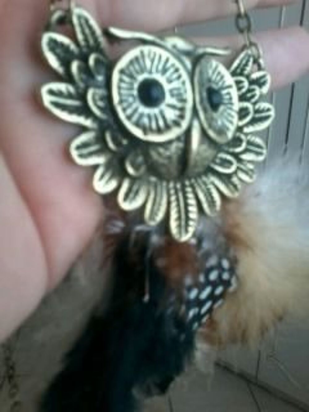 CHAINE et PENDENTIF TETE CHOUETTE AVEC PLUME Bijoux et montres