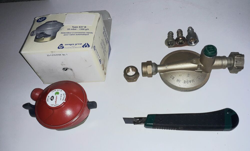 Bouteille de gaz pleine, avec sa capsule de protection. Cuisine