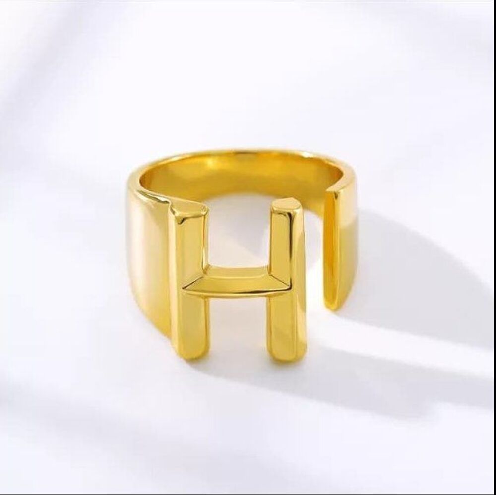 Bague manchette H Bijoux et montres