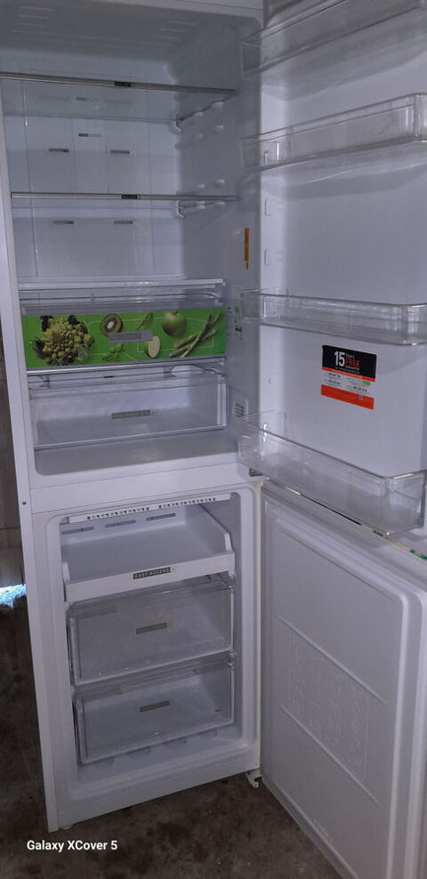 Frigo-cong�lateur WHIRLPOOL 300 Denneville (50)