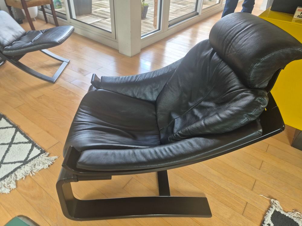 2 fauteuils kroken Roche Bobois cuir noir Meubles