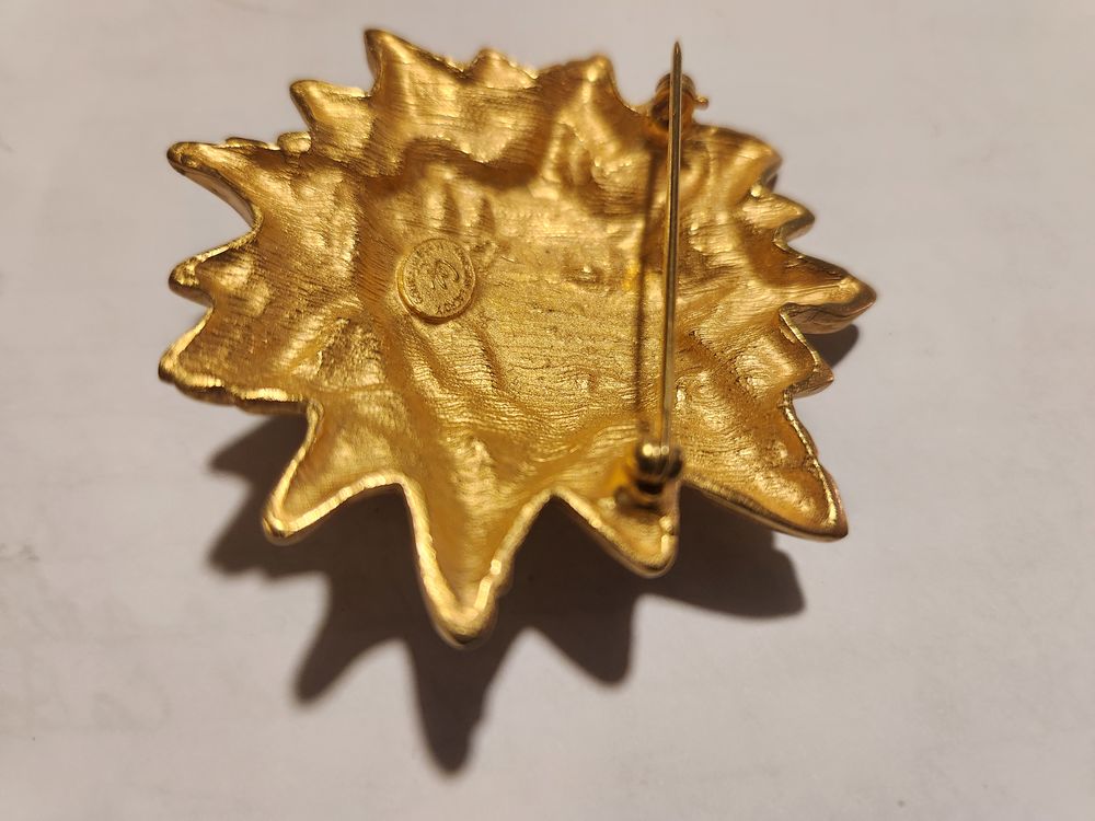 Broche soleil souriant dor&eacute; Christian LACROIX Bijoux et montres