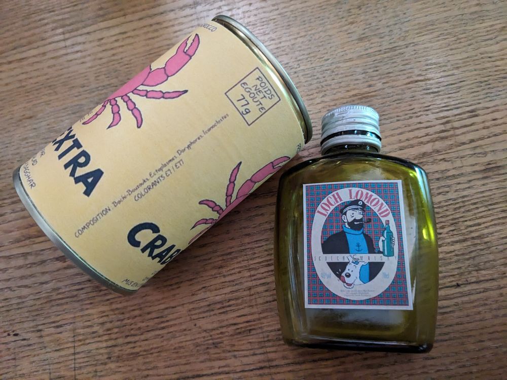 tintin et Milou bo&icirc;te de conserve plus bouteille du capitain Electroménager