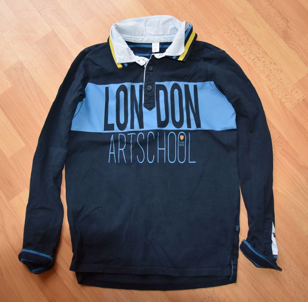 10 ans. Polo manches longues.Okaidi. Tr&egrave;s bon &eacute;tat Vêtements enfants