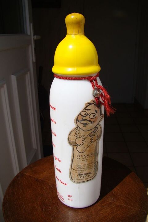Ancienne bouteille / biberon Armagnac Ducastaing (vide) 1960 20 Gargenville (78)