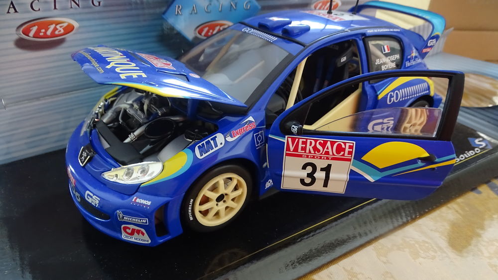 Miniatures 1/18 PEUGEOT 206 WRC de chez SOLIDO Jeux / jouets