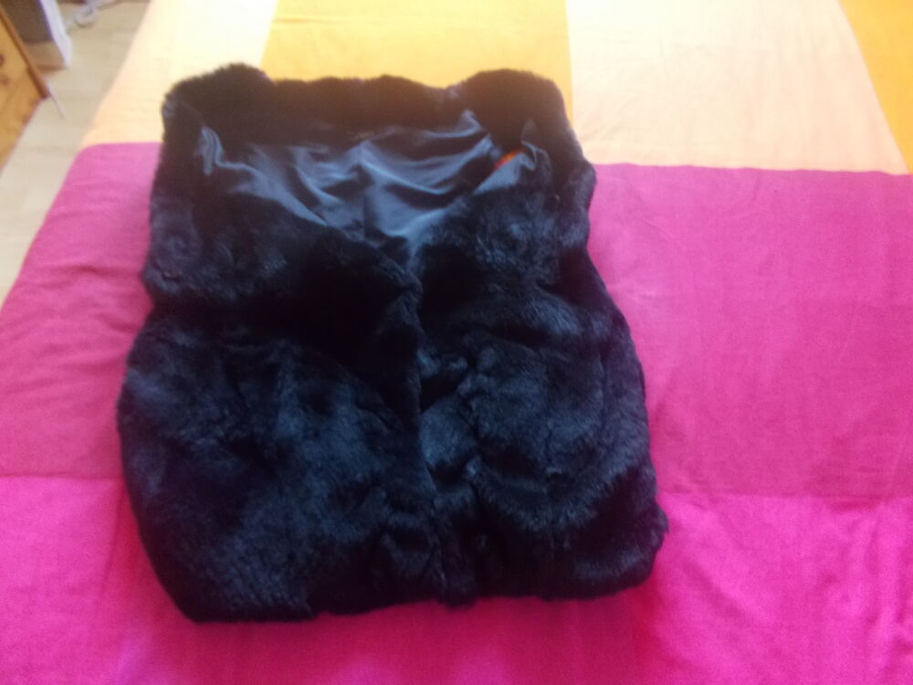 veste fourrure sans manches Vêtements