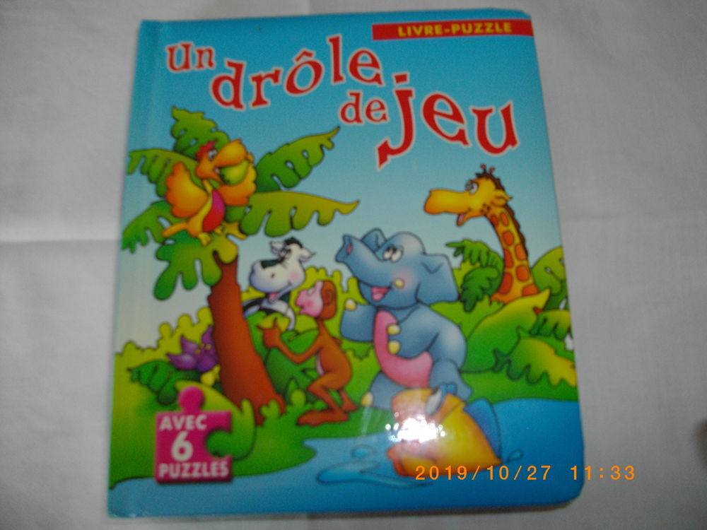 LIVRE AVEC HISTOIRE ET PUZZLES : "UN DROLE DE JEU" Jeux / jouets
