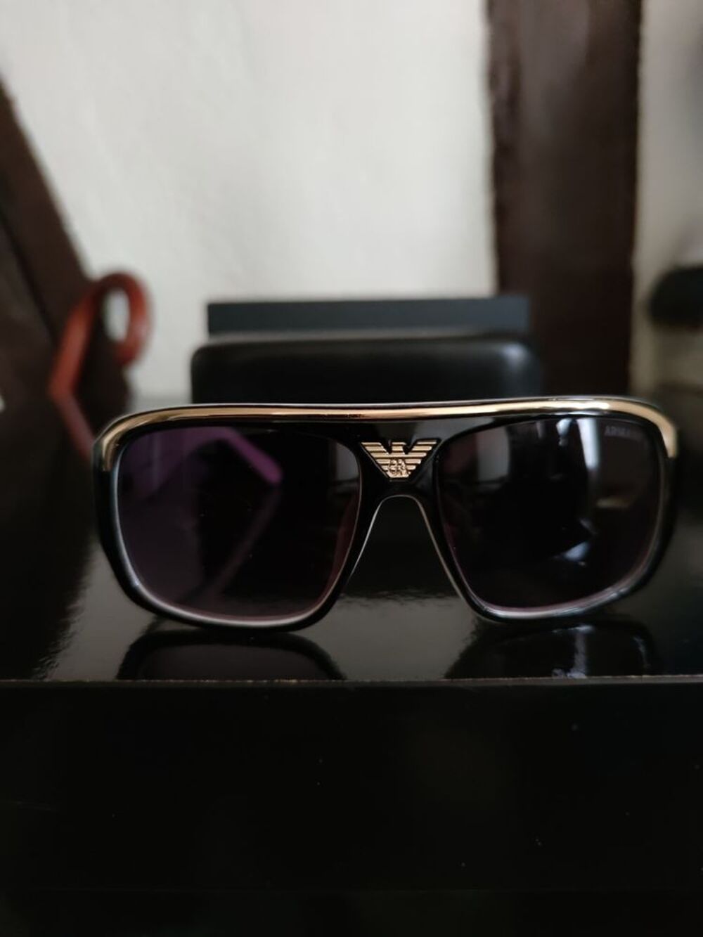 lunettes de soleil emporio armani mixte noire et blanche Bijoux et montres