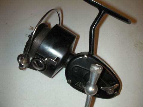 Moulinet lancer MITCHELL 300 + bobine 25 Roques (31)