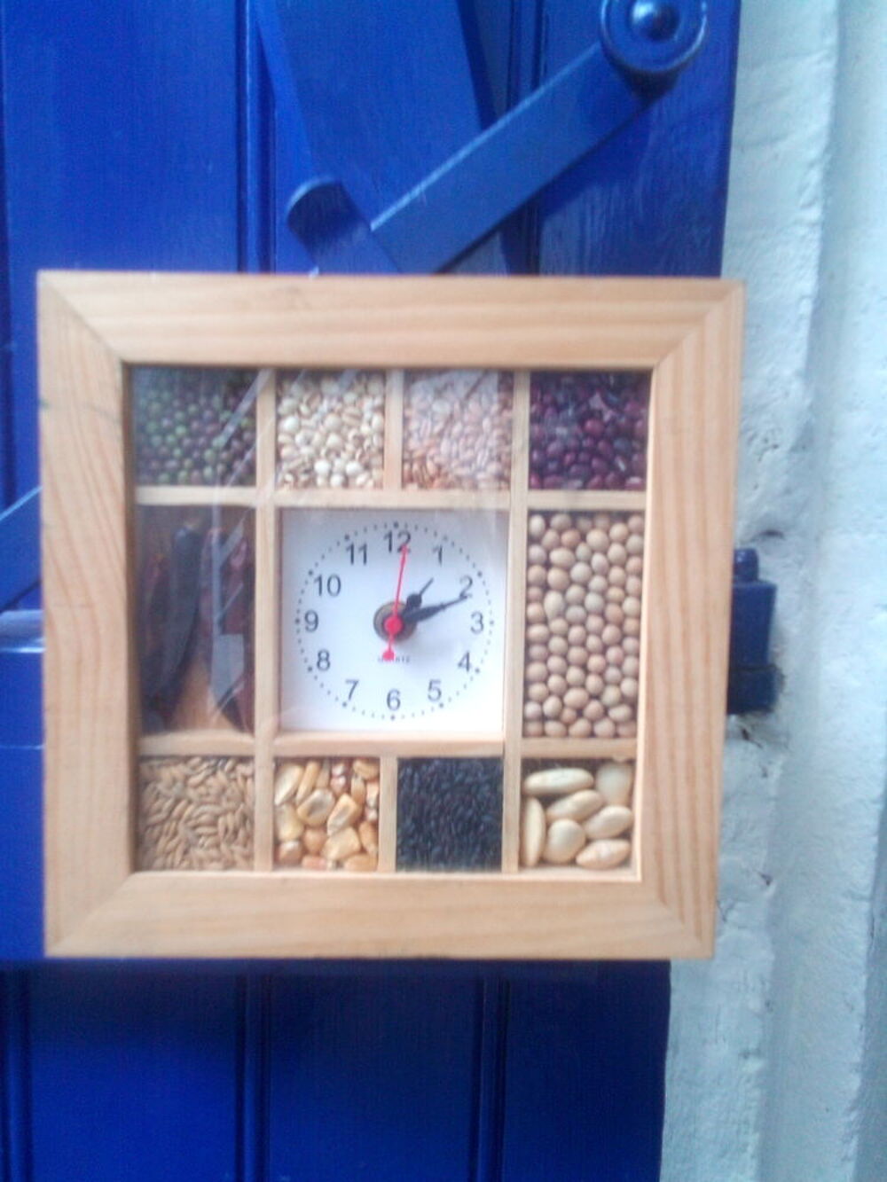 horloge murale avec compartiments de graines et condiments Décoration