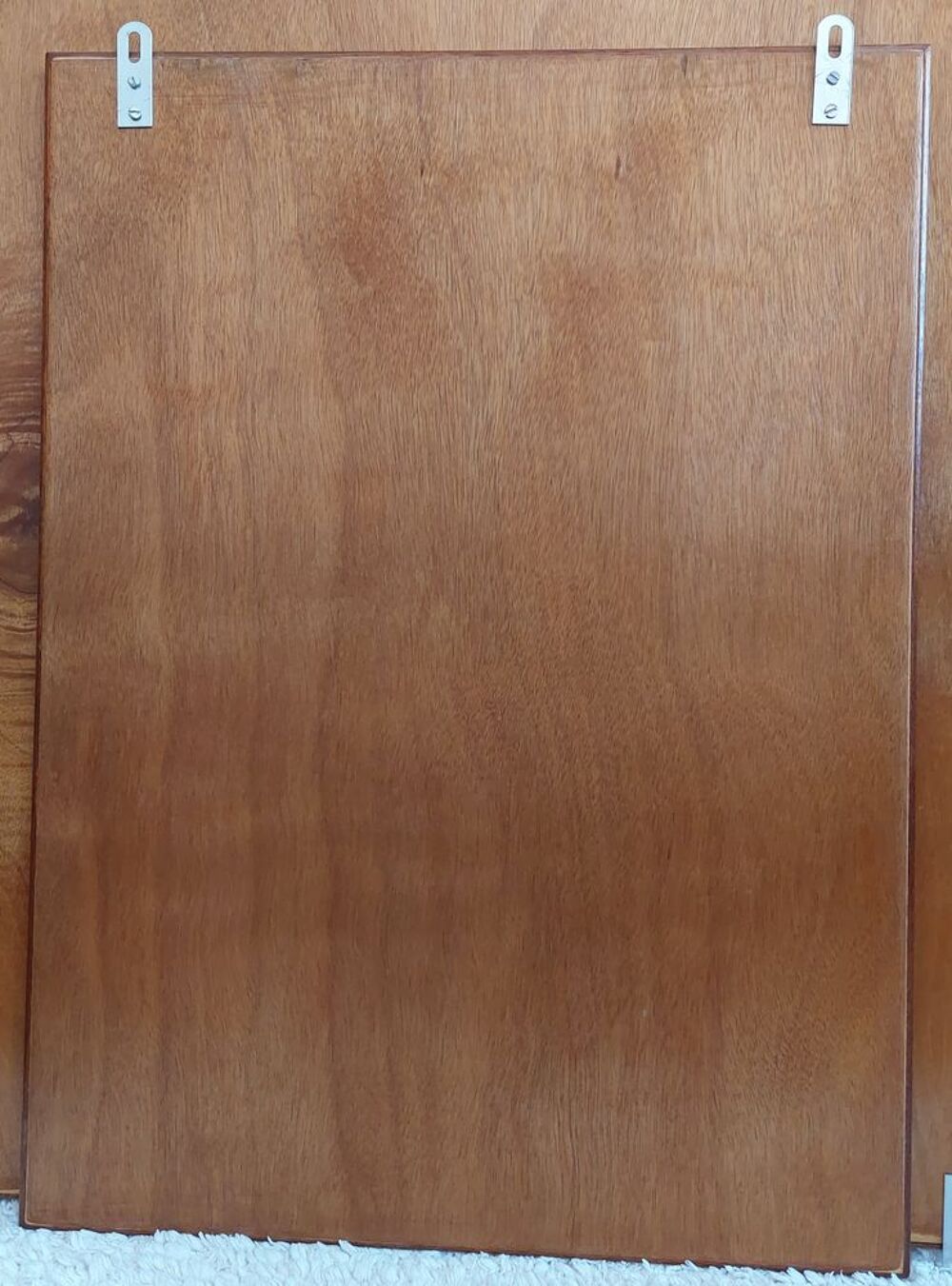 Puzzle : Dauphins 
Encadr&eacute; sur un support en bois
Décoration