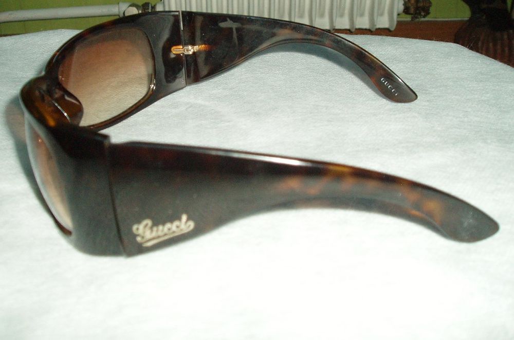 Lunettes solaires GUCCI Bijoux et montres