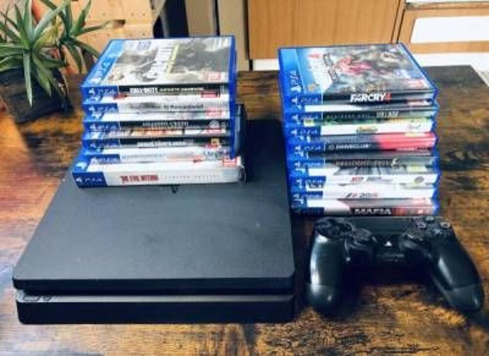 Console PS4 slim 1to 2 manettes 14 jeux Consoles et jeux vidéos