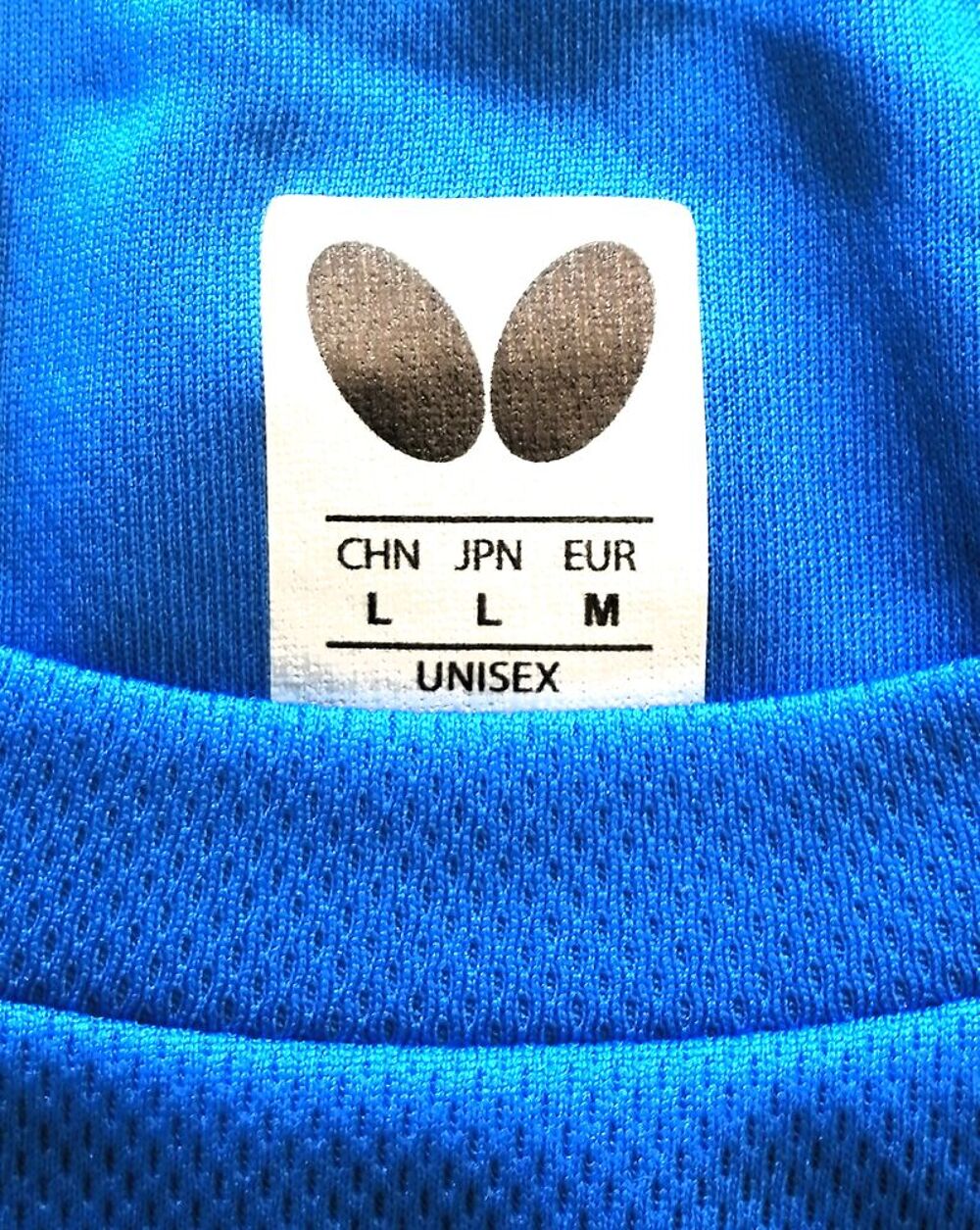 Polo Butterfly unisexe - Taille M neuf Vêtements