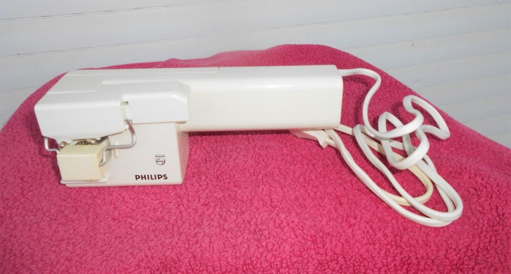 ouvre-bo&icirc;tes &eacute;lectrique PHILIPS avec range fil Electroménager