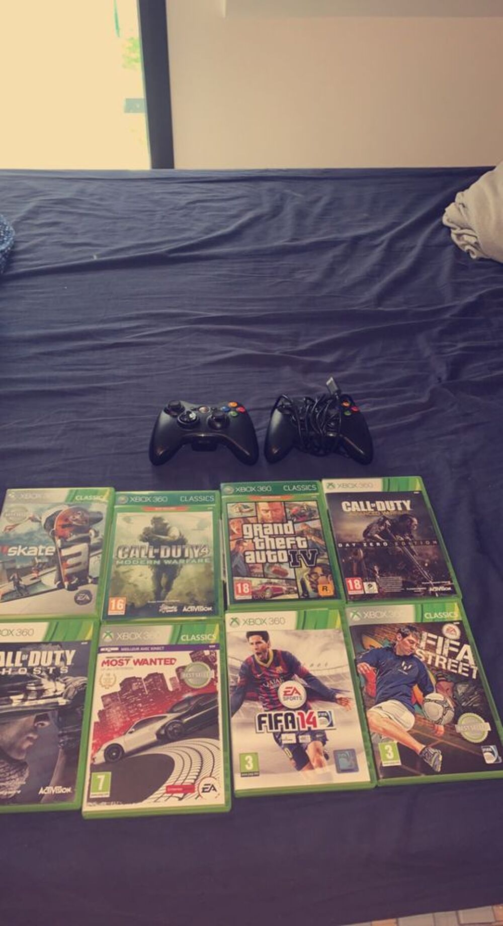 xbox 360 2 manettes et 8 jeux Consoles et jeux vidéos