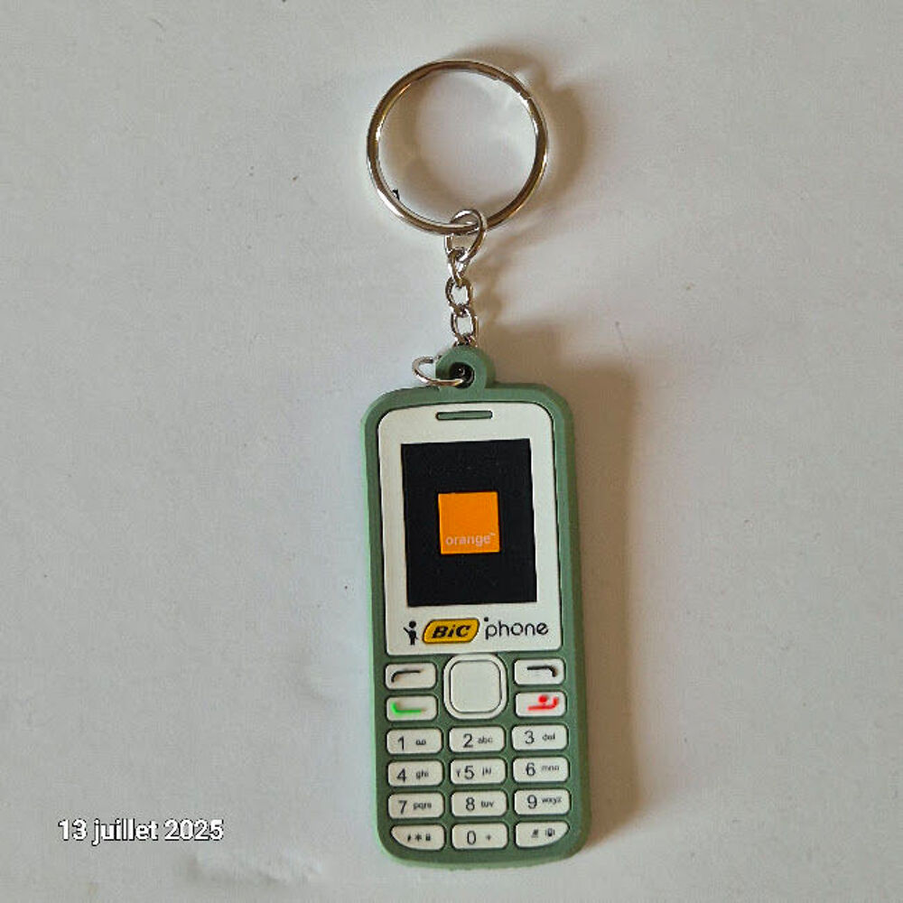 Porte cl&eacute; vintage neuf sous emballage d'origine, t&eacute;l&eacute;phone O 
