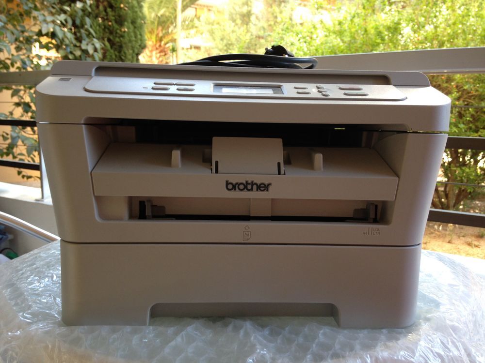 ?	Imprimante-photocopieuse laser Brother DCP 7055 Matriel informatique