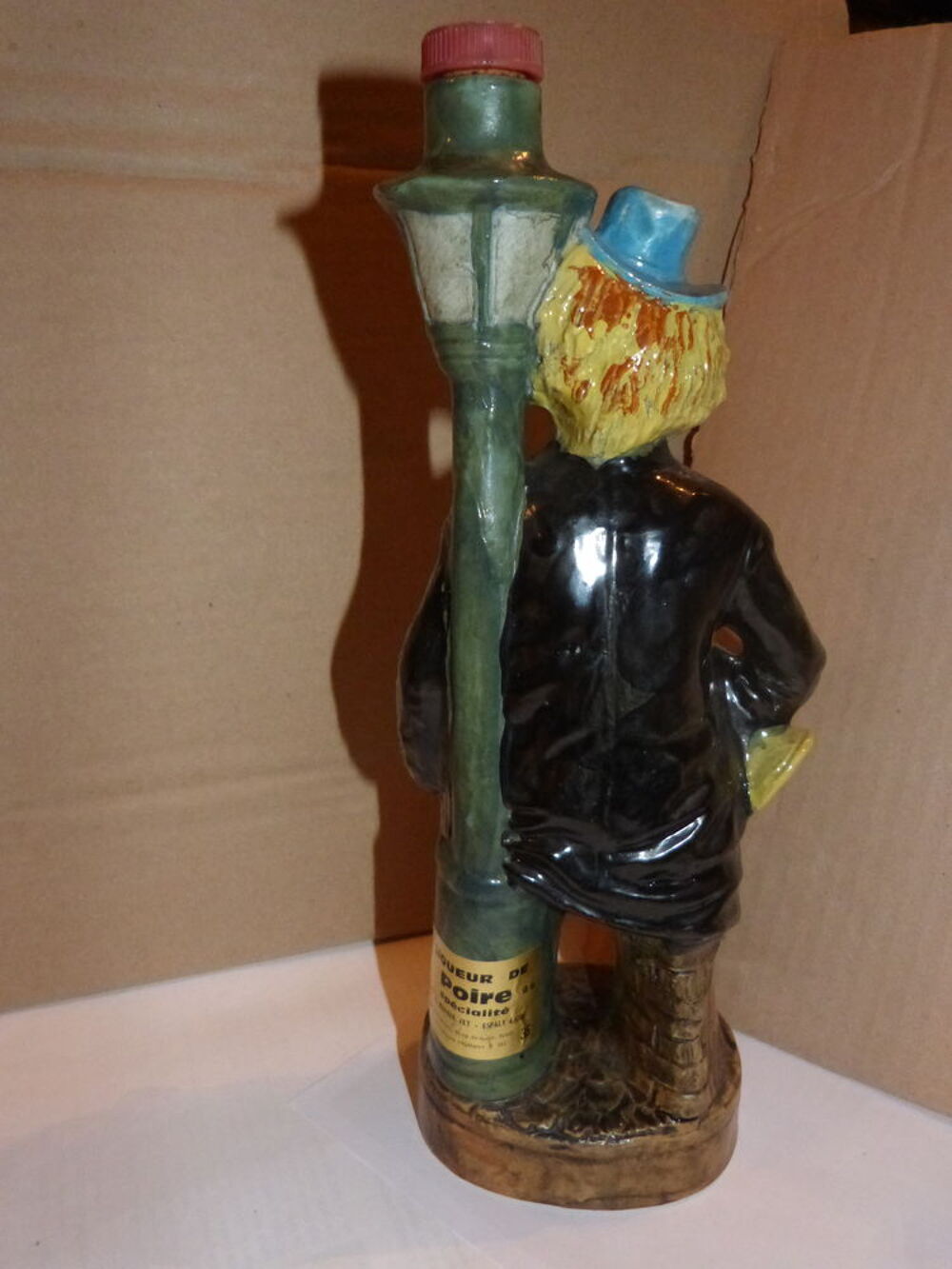 BOUTEILLE EN FORME DE CLOWN AVEC TROMPETTE 