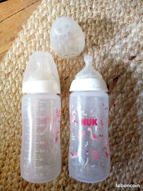 2 biberons Nuk 300 ml avec tétine anti colique 5 Beauchamp (95)