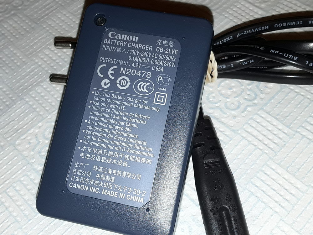 chargeur batterie canon +batterie promaster Photos/Video/TV