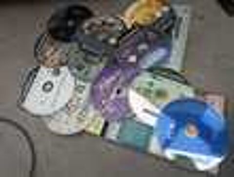 PlayStation 2 avec jeux vid&eacute;o de manette et une carte m&eacute;moire Consoles et jeux vidéos