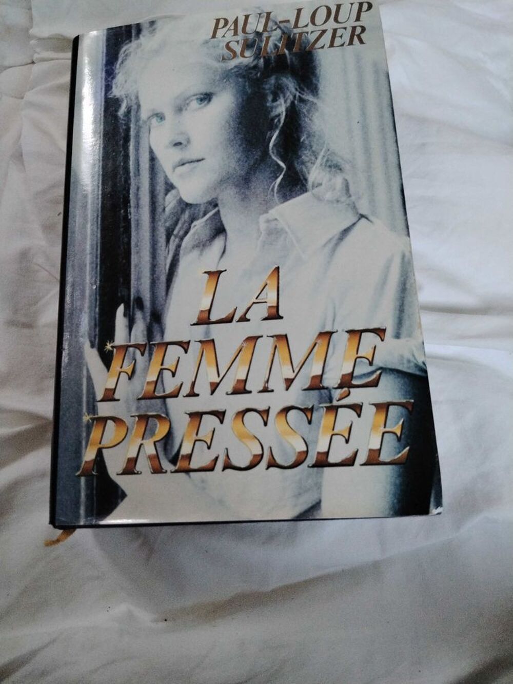 livre la femme press&eacute;e Livres et BD