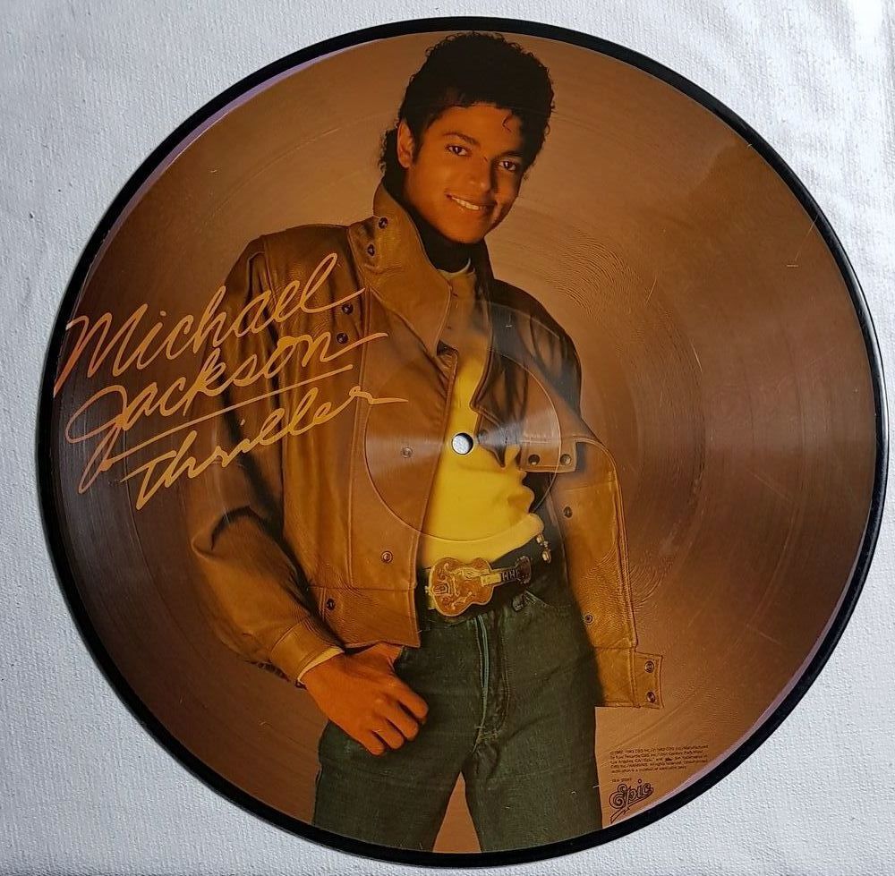 MICHAEL JACKSON Sign&eacute; - LP THRILLER EO 1982 + picture disc CD et vinyles