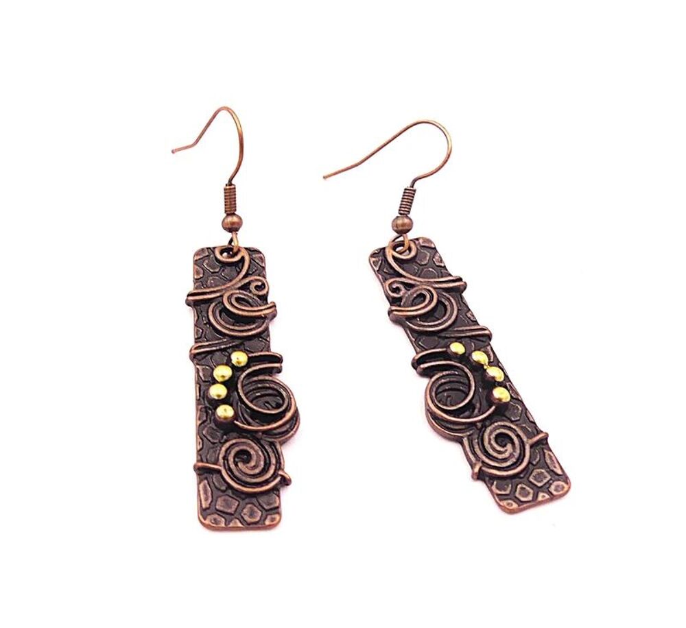 Boucles d'oreilles m&eacute;tal cuivr&eacute; travaill&eacute;es Bijoux et montres