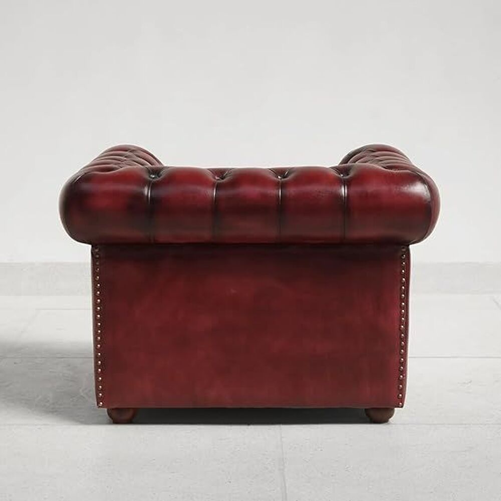 Fauteuil Chesterfield en cuir bourgogne, structure en teck Meubles