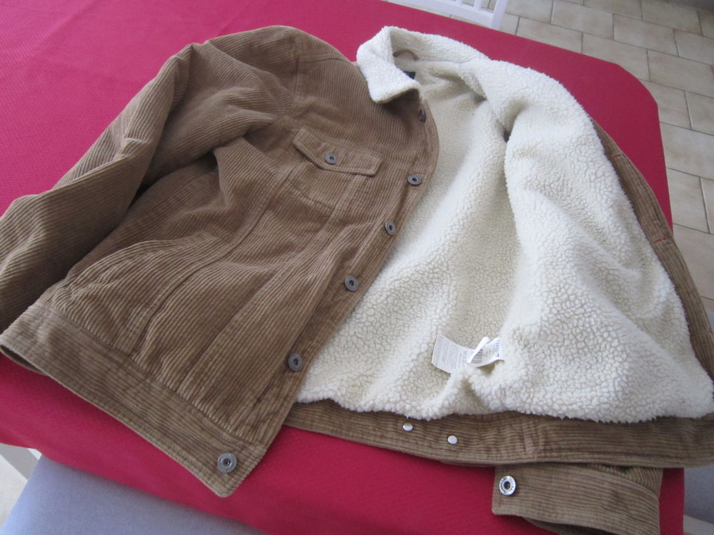 Un blouson Homme Vêtements