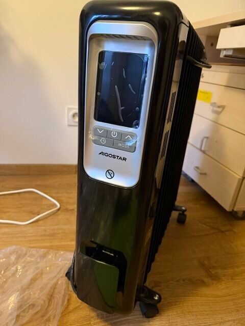Radiateur bain d'huile Aigostar 2500 W ? Comme neuf, télécom Ferney-Voltaire (01)