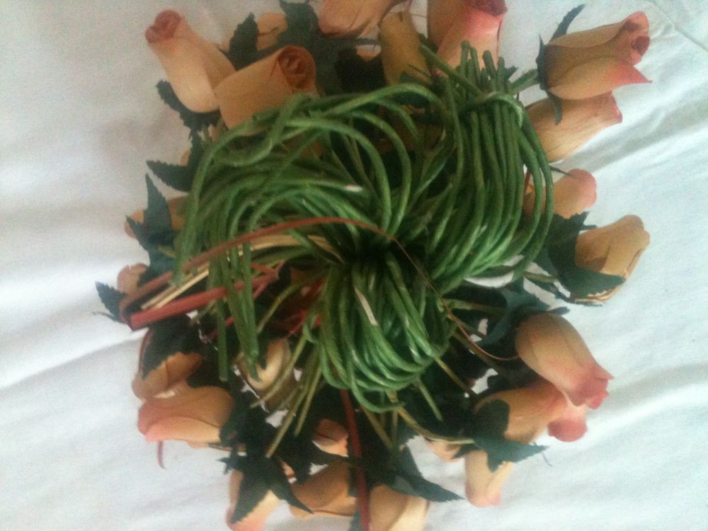 Bouquet de roses en boutons artificielles en bois
Décoration