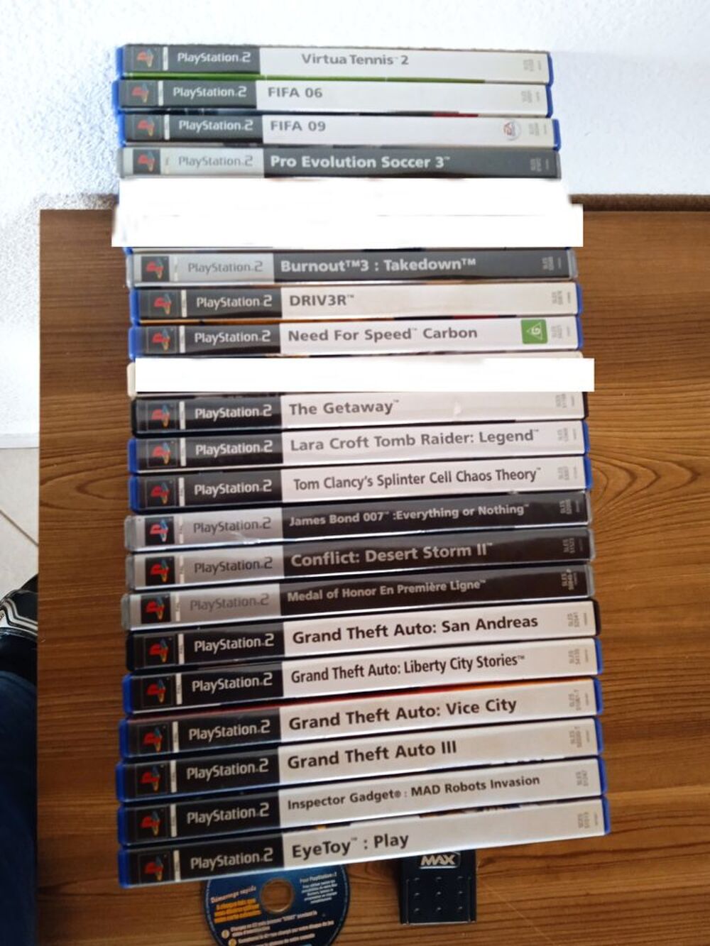 Lot de 19 jeux vid&eacute;os + webcam pour Playstation 2 Consoles et jeux vidéos