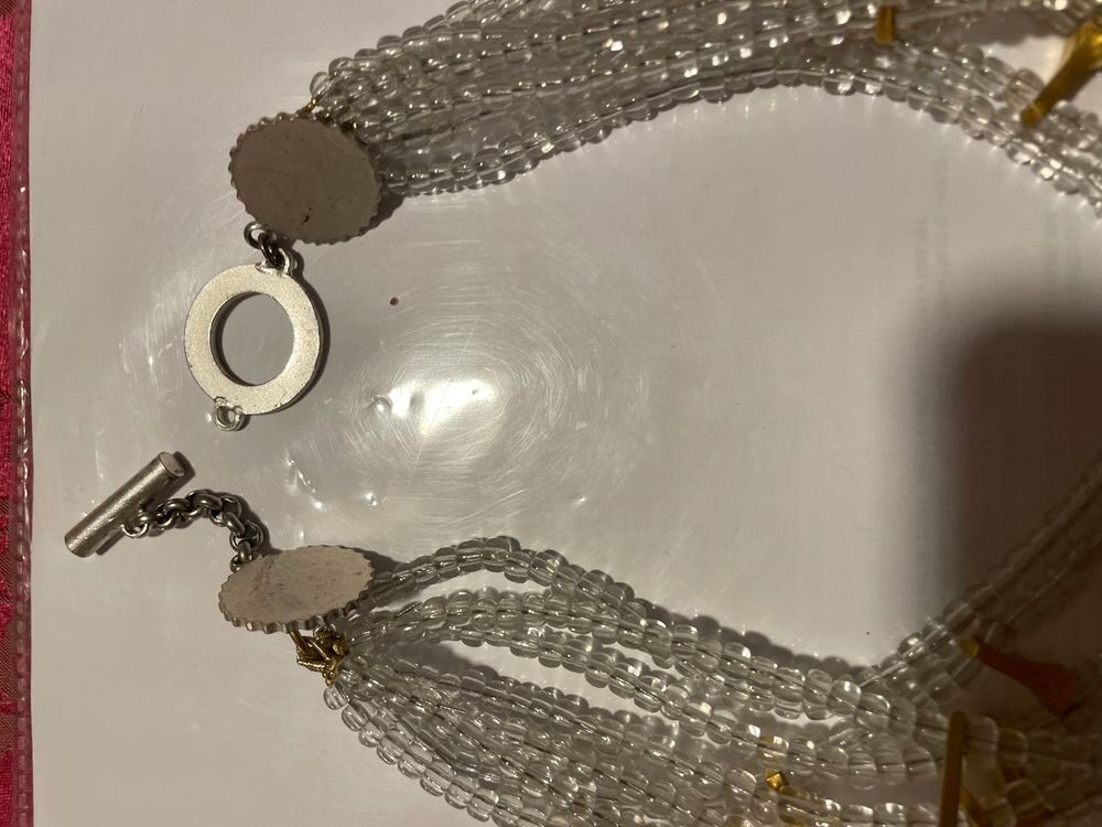 Collier d&eacute;fil&eacute; 8 rangs enfilage perles motifs dor&eacute;s ANTIGONA Bijoux et montres
