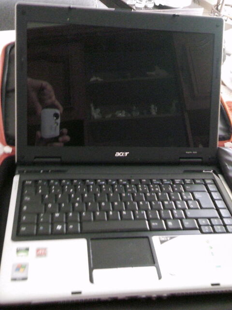 ?  Ordinateur portable avec sa pochette de transport. 100 Marmande (47)