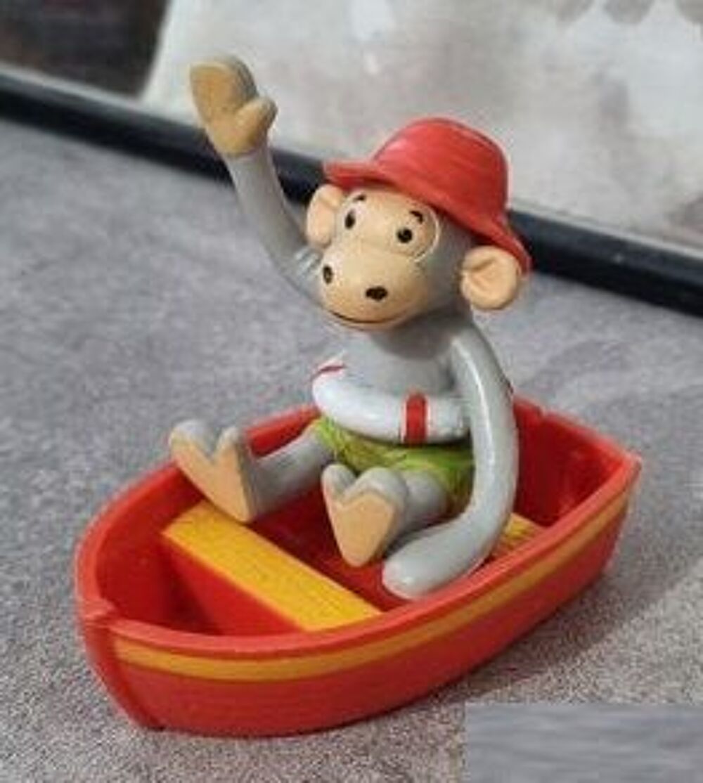Singe Popi dans sa barque Jeux / jouets