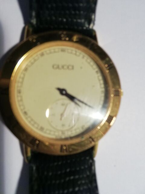 Montre analogique boîtier doré Gucci Colmar (68)