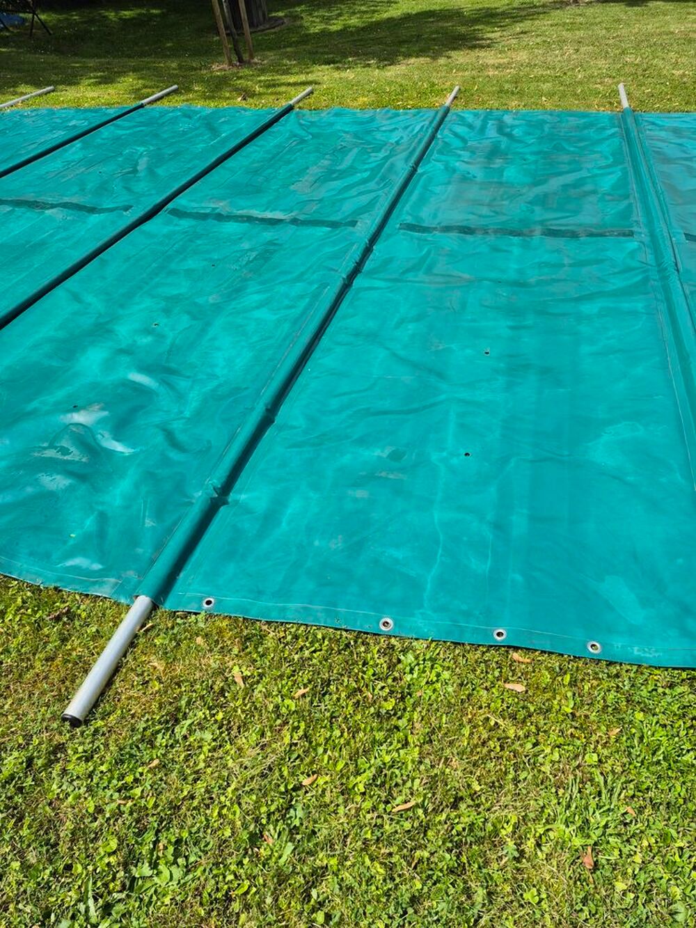 B&acirc;che piscine &agrave; barres Jardin