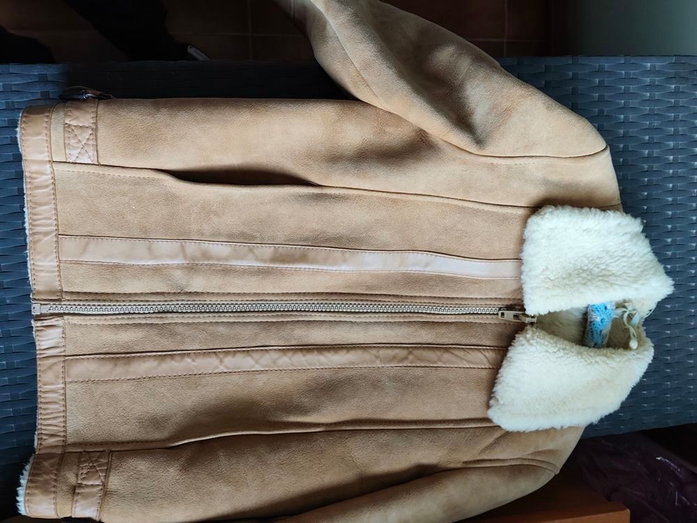 Blouson en peau fourr&eacute;e Vêtements