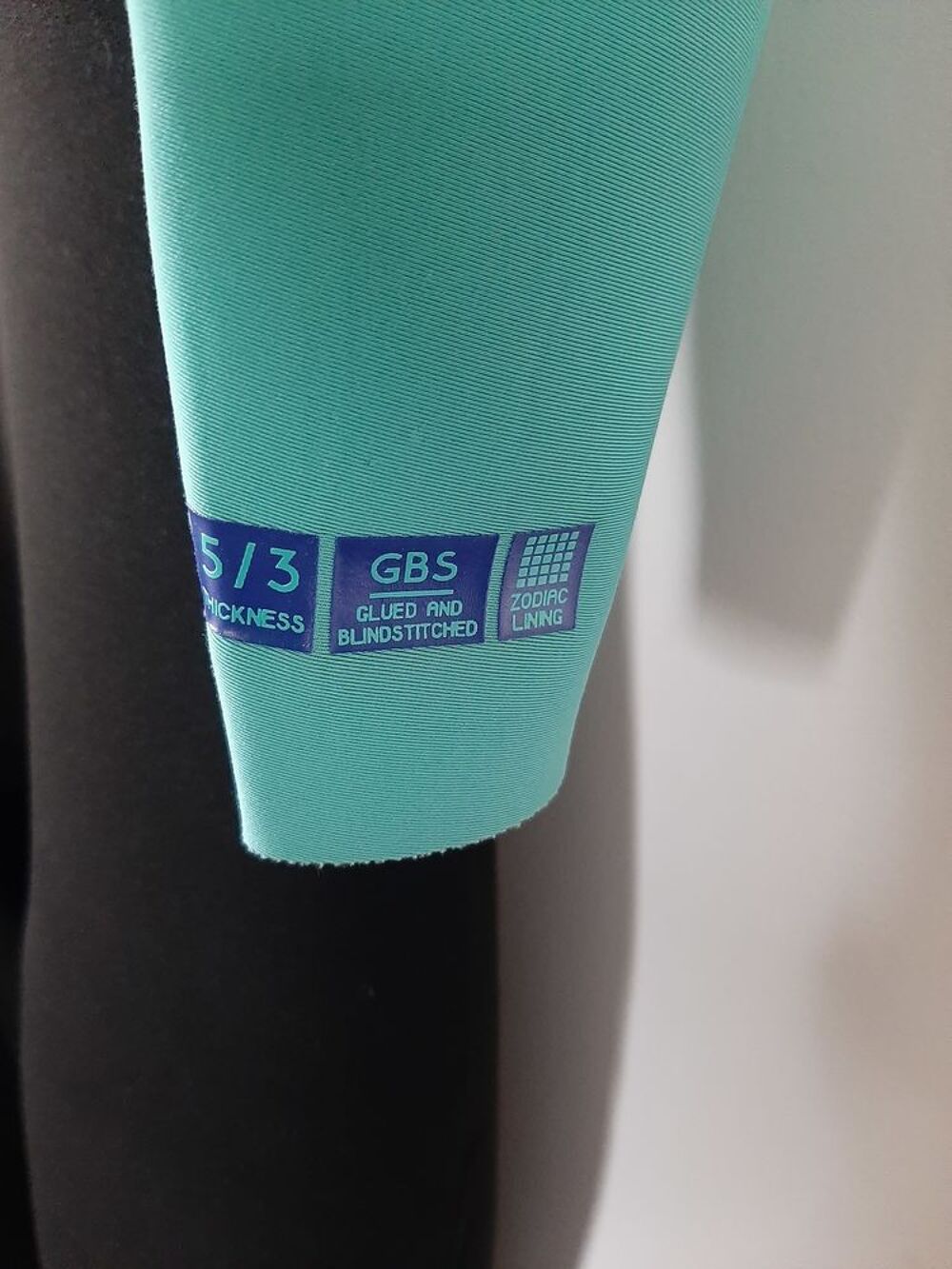 Combinaison int&eacute;grale n&eacute;opr&egrave;ne noir turquoise Sports