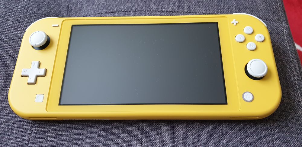 Switch Lite jaune Consoles et jeux vidos