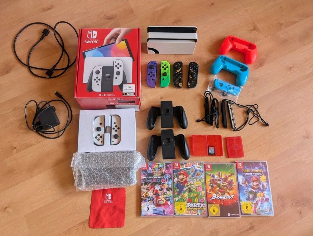 Nintendo+Switch+OLED,+mod&egrave;le+blanc,+avec+Mario+Kart+8+Deluxe+++jeux+.XXL Consoles et jeux vidéos