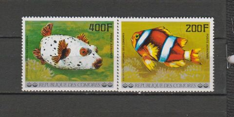 P.A. N 128 & 129 = 2 TIMBRES COMORES NEUFS** DE 1977 2 Le Coudray-Montceaux (91)