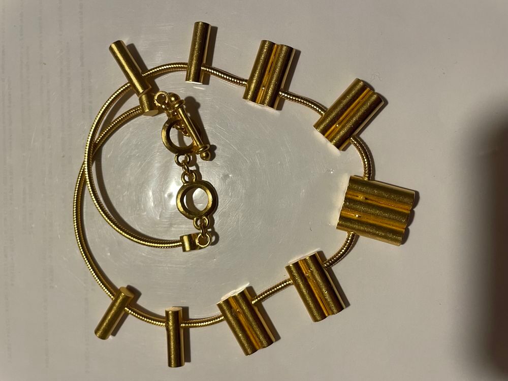 Collier dor&eacute; bat&ocirc;nnets sur chaine serpent ANTIGONA Bijoux et montres