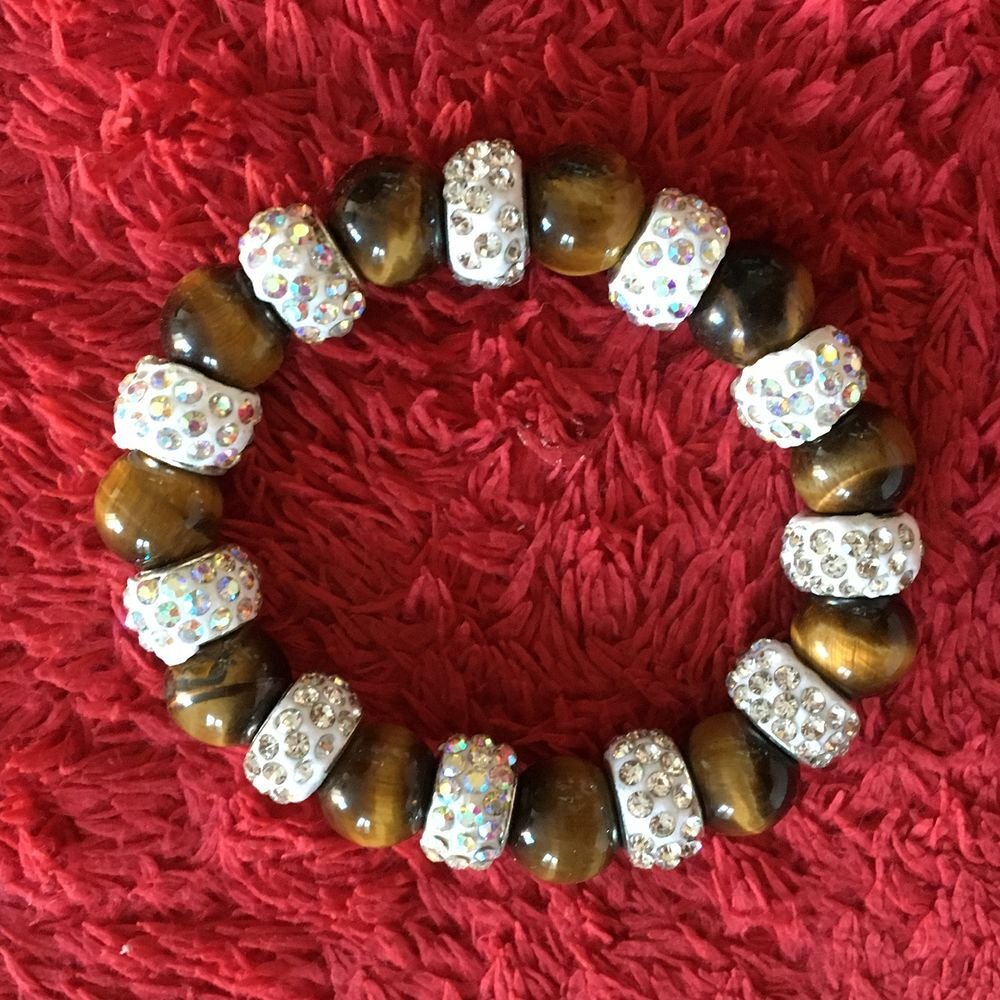 Bracelet ?il tigre Bijoux et montres