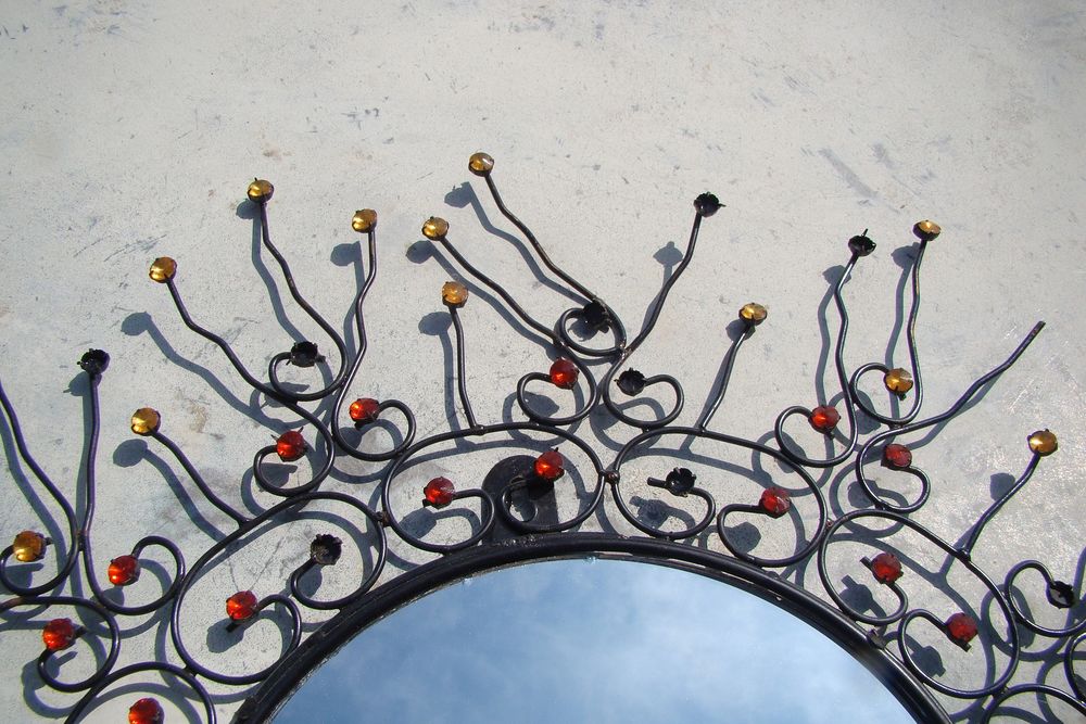 Miroir rond soleil 
Décoration